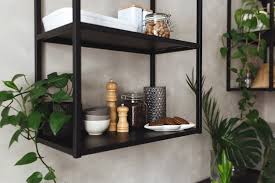 Black Metal Shelves In The Kitchen On A