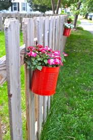 Making Fence Planters From Cans