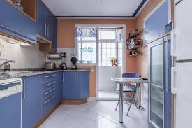 Plain Blue Cabinets With Cherry Wood