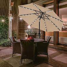 Zeus Ruta 9 Ft Solar Umbrella 32 Led Lighted Patio Umbrella Table Market Umbrella With Push On Tilt Crank Tan