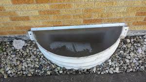 Basement Window Well Drain Installation