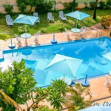 The Palm Tree Garden Hotel Day Evening