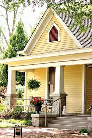 Inviting Porch House With Olive Accents