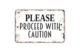 Please Proceed With Caution Sign