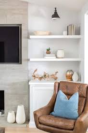 Floating Fireplace Shelves Over Cabinet