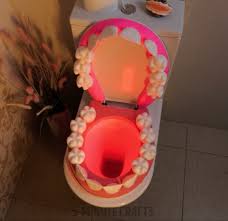 Toilet Into A Giant Toothy Mouth