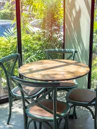 Vintage Wooden Table Set In Glass Room