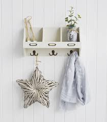 White Wooden Wall Shelf With Hooks