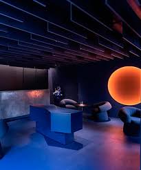 Italian Bar Lounge In Neon Orange Light