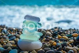 Sea Glass Stones Arranged In A Balance