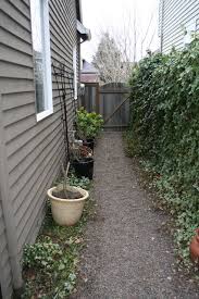 Garage Side Yard With Pea Gravel