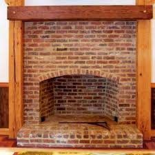 reclaimed wood beams rustic fireplace