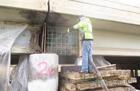 repairing damaged concrete bridge girders