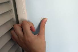 Remove Tape Adhesive From Painted Walls