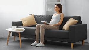 Sitting On Couch Stock Photos Royalty