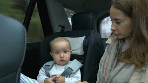 Mom And Baby Girl Ride In The Car In