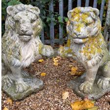 Pair Of Ornamental Stone Sitting Lions