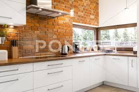 Kitchen With Brick Wall Stock Image