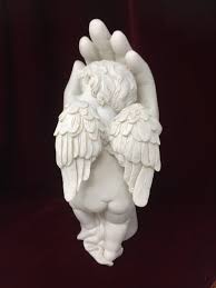 Serene Cherub In Hand Figurine Angelic
