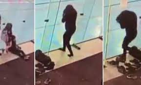 A Woman Bumps Into Glass Partition Not