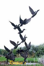 Fiber Carved Flying Bird Sculpture At