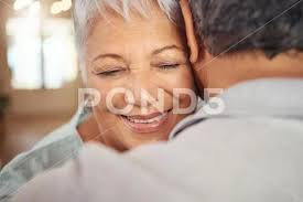 Love Smile And Elderly Couple Hug In