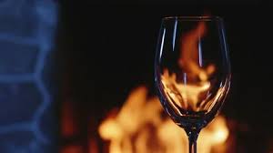 Wine Glass Next To A Fireplace Cozy