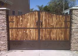 Ornamental Iron And Wooden Driveway Gates