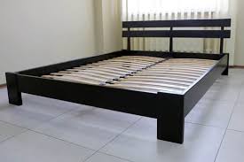 ilize a wobbly wooden bed frame