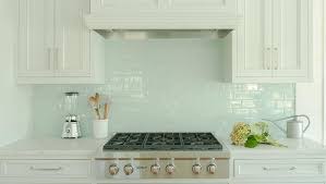 White Kitchen Cabinets With Blue Glass