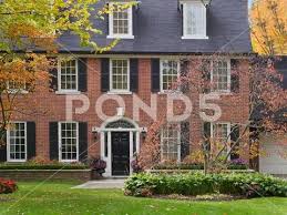 Large Suburban House In Fall Stock