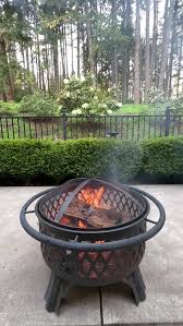 Fire Burning In Fire Pit On Patio