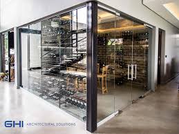 Wine Cellar In A Seamless Glass Facade