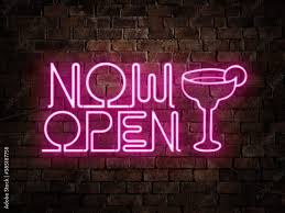Now Open Neon Pink Sign Of A Bar Or Pub