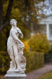 Old Park Statue Of Sensual Greek Or