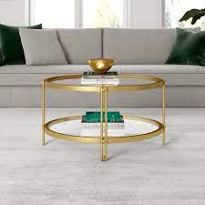 Inez 32 Wide Round Coffee Table With Glass Shelf In Brass