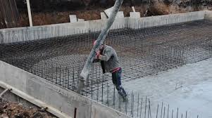 Builders Pouring The Concrete Floor