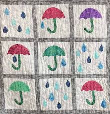 Umbrellas And Raindrops Quilt