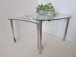 Swivel Glass And Chrome Coffee Table