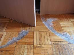 Scratched Parquet Flooring In The Room