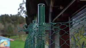 Green Chain Link Fence With A Metal
