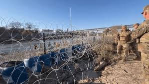 Remove Razor Wire Along Border