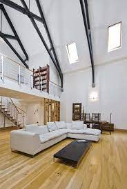 featuring ceilings with exposed beams