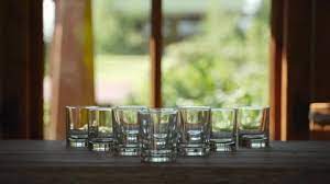 Empty Shot Glasses Stand In Wedge In