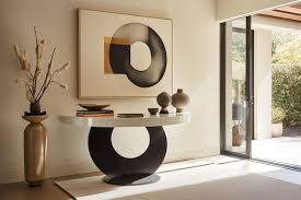 Sculptural Console Table A Round Mirror