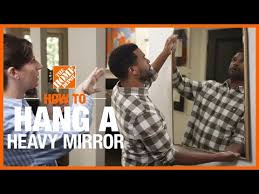 How To Hang A Heavy Mirror The Home Depot