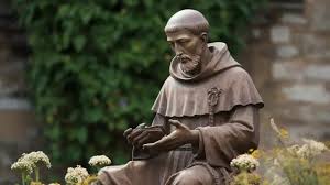 Statue Of St Francis Outside A Church