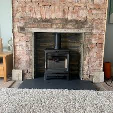 Brick Living Room Fireplace With A T