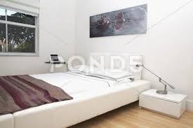 Bed Wall Art And Night Tables In