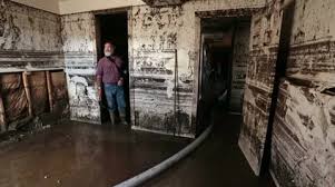 Flood Basement Man Walks Through Room